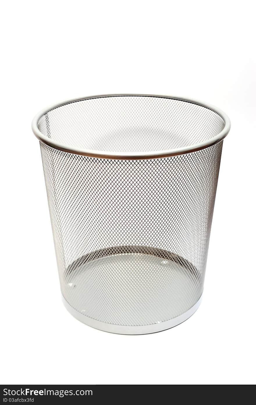 Silver mesh trash basket empty on white background