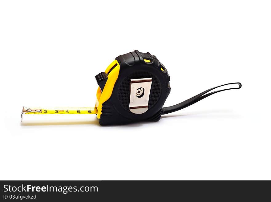 Extended retractable tape measurer on a white background. Extended retractable tape measurer on a white background