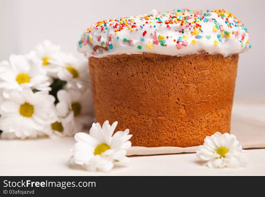 Easter cake and white flowers