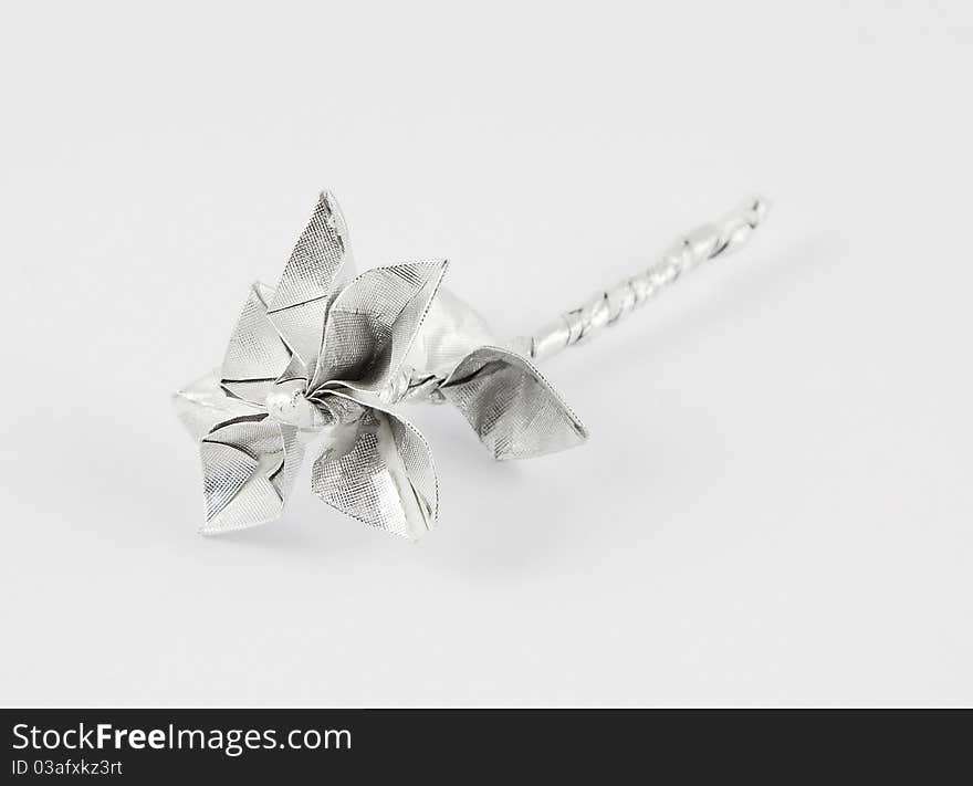 Beautiful flower origami made of silver paper