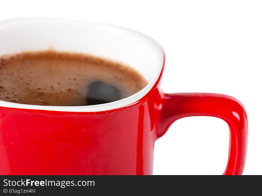 A red cup of coffee isolated over white background