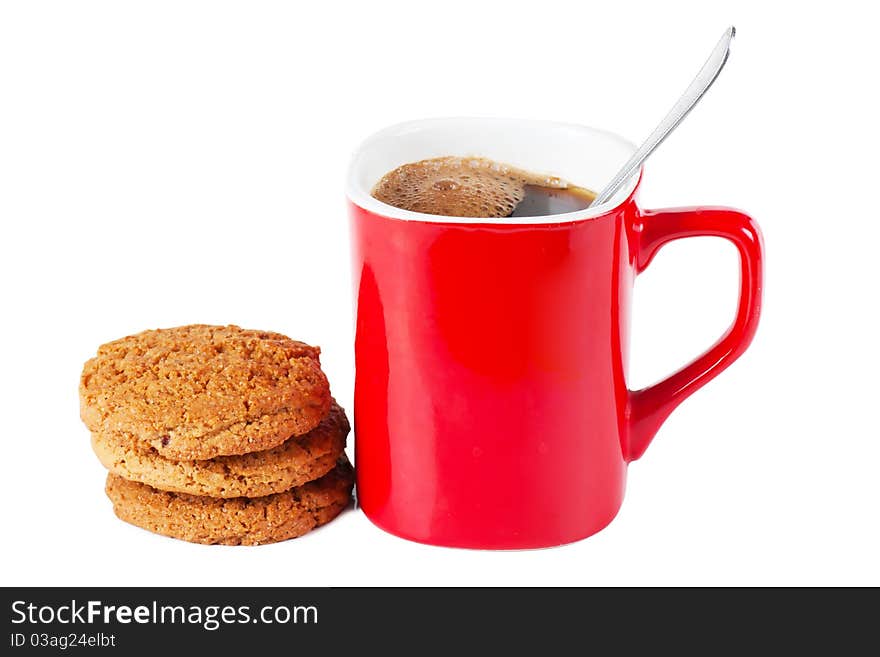 A red cup of coffee and cookies isolated over white background