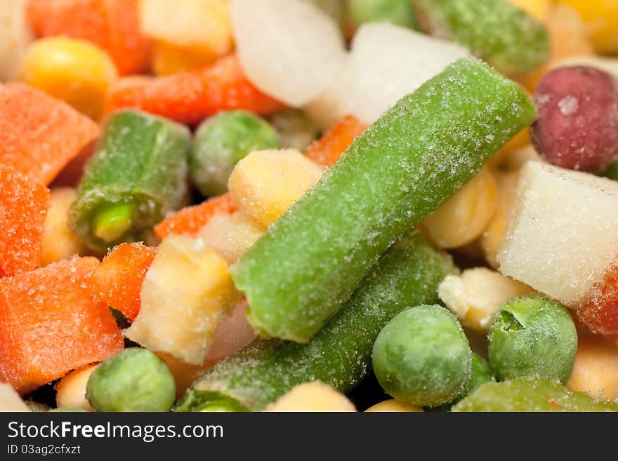 Background with colorful frozen vegetables