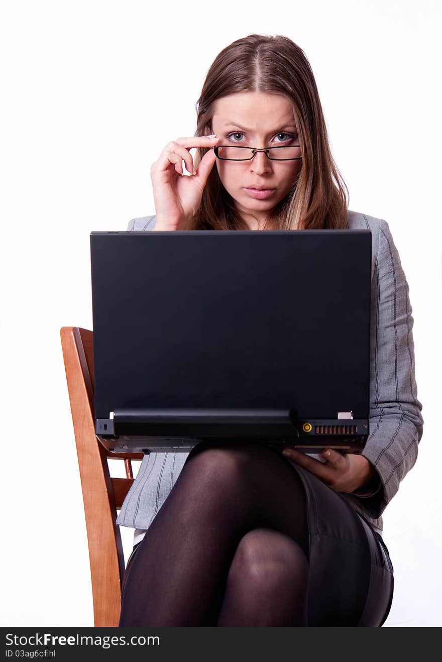 Young upset woman with notebook.