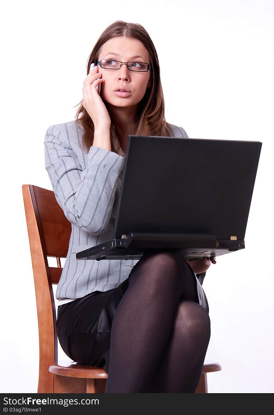 ATTRACTIVE WOMAN WITH NOTEBOOK AND SMARTPHONE