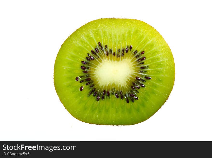 A single slice of kiwi fruit on a white background