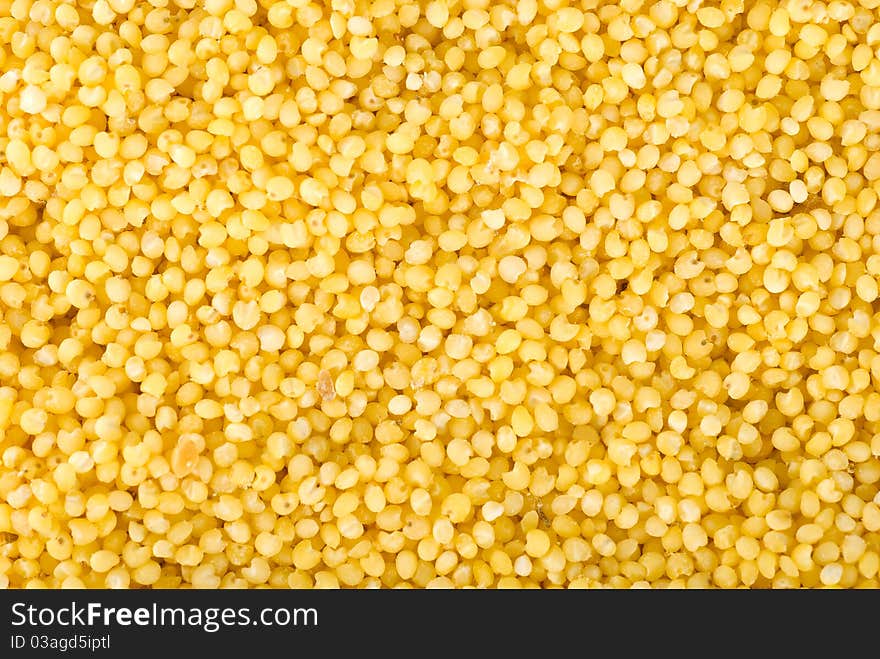 Millet seed cereal yellow backgrounds texture dry. Millet seed cereal yellow backgrounds texture dry