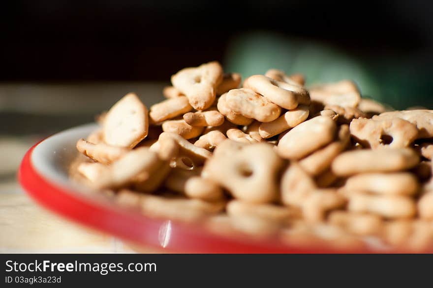 Closeup image of ceramic plate with crackers on it. Closeup image of ceramic plate with crackers on it