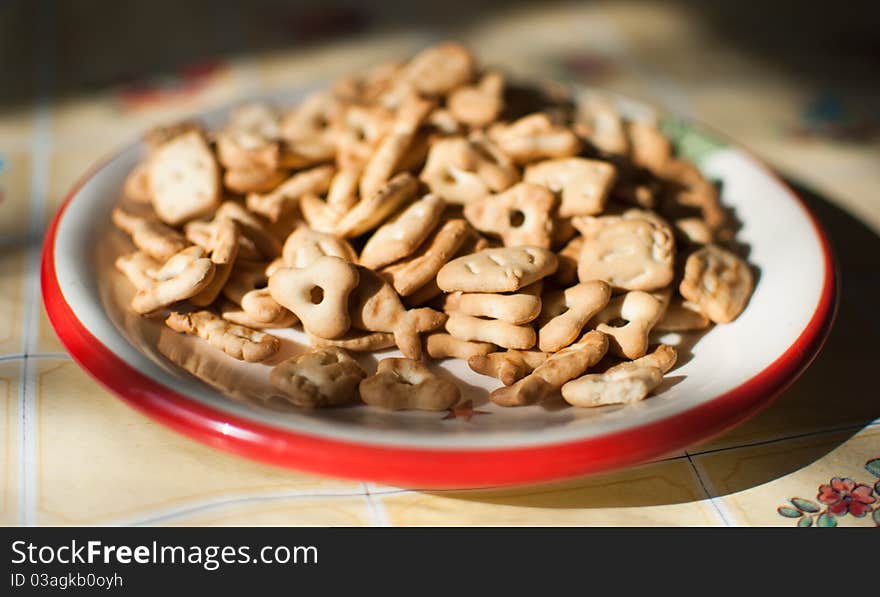 Closeup image of ceramic plate with crackers on it. Closeup image of ceramic plate with crackers on it