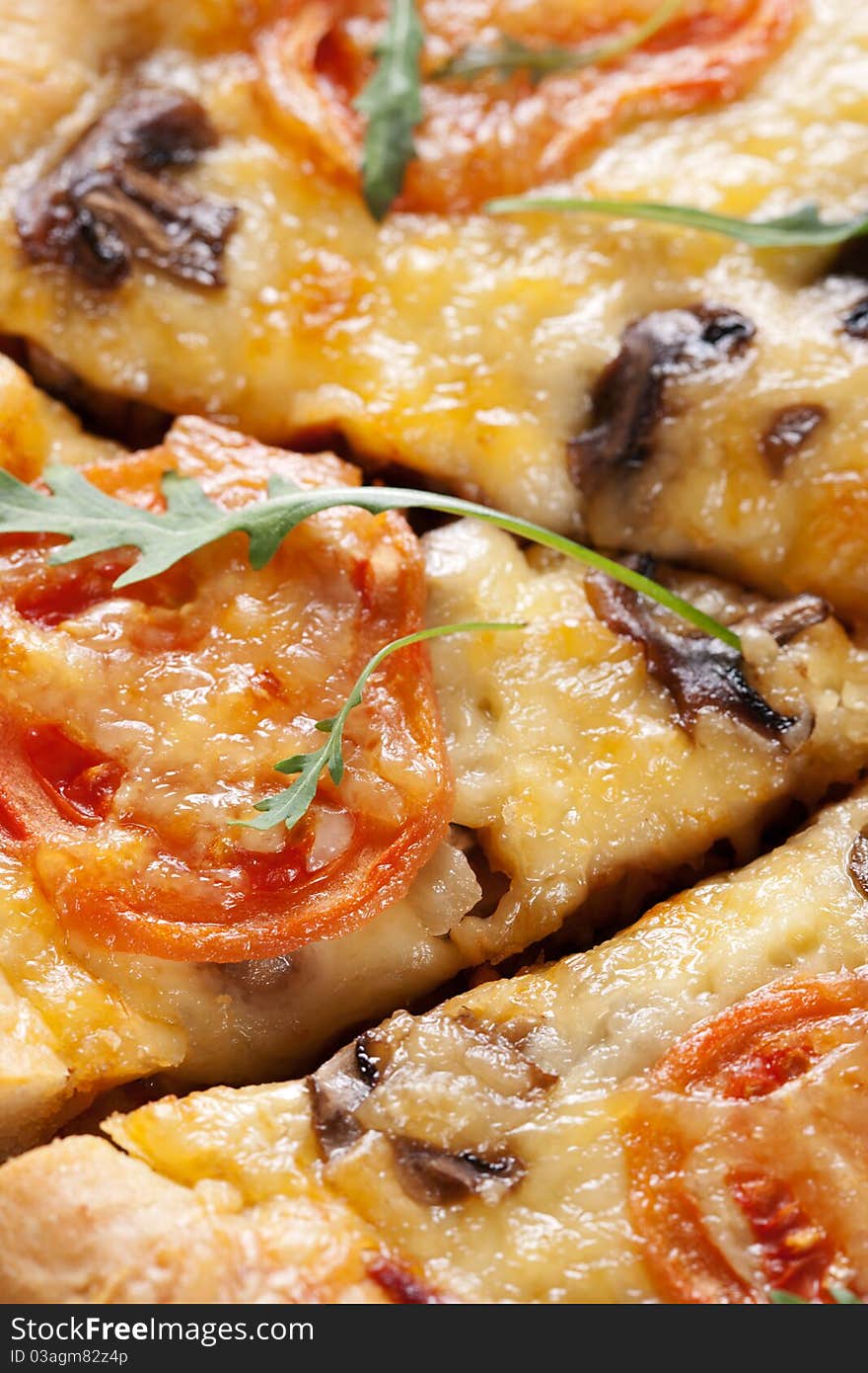 Pizza with mushroom and tomatoes