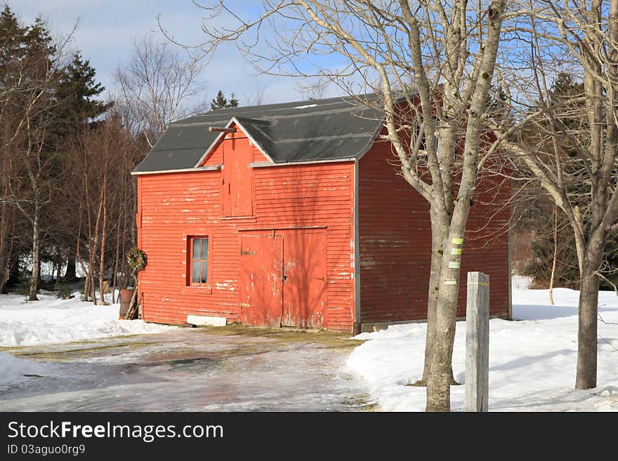 Old red barn in winter