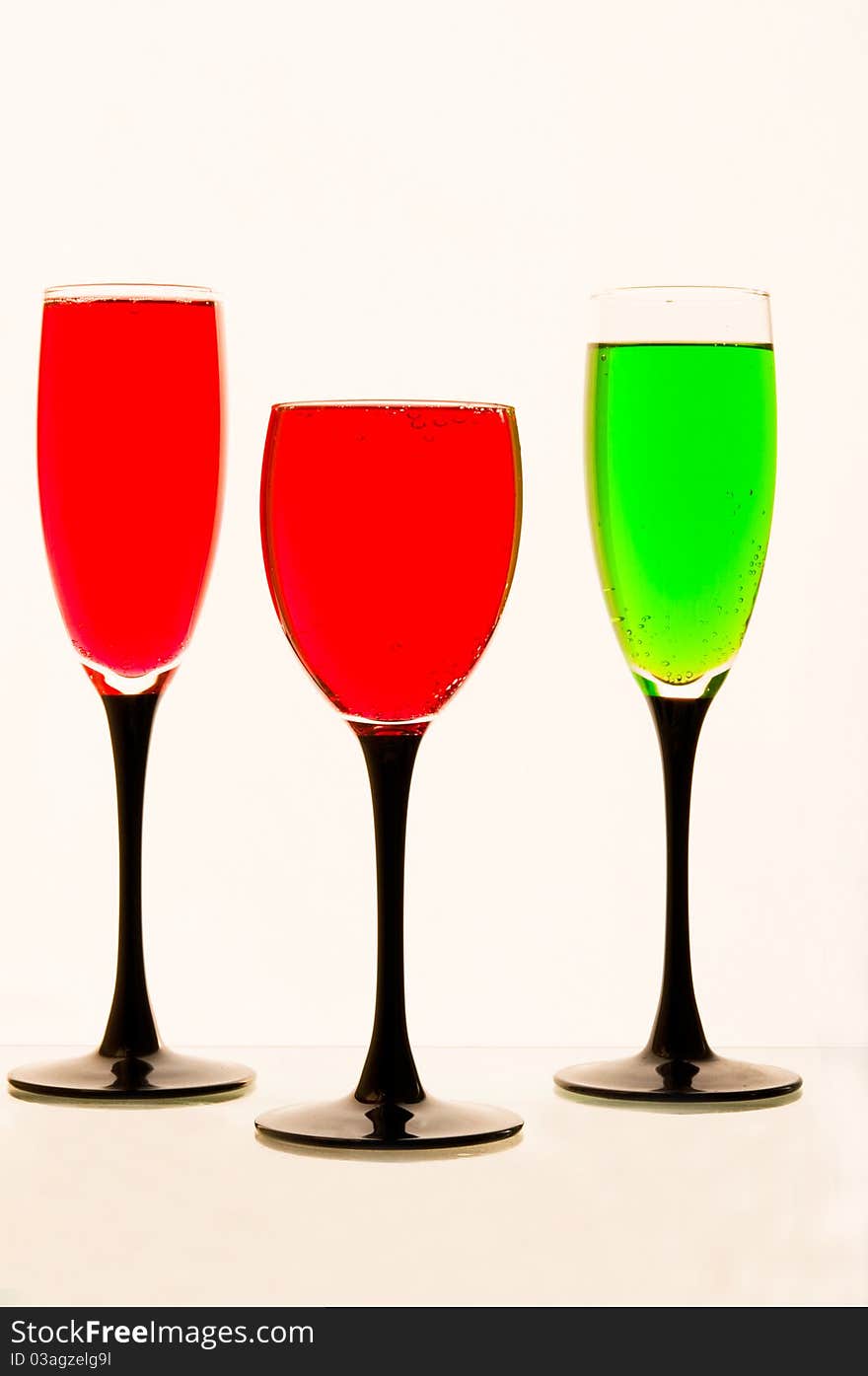 Lemonade in glasses of green, red color