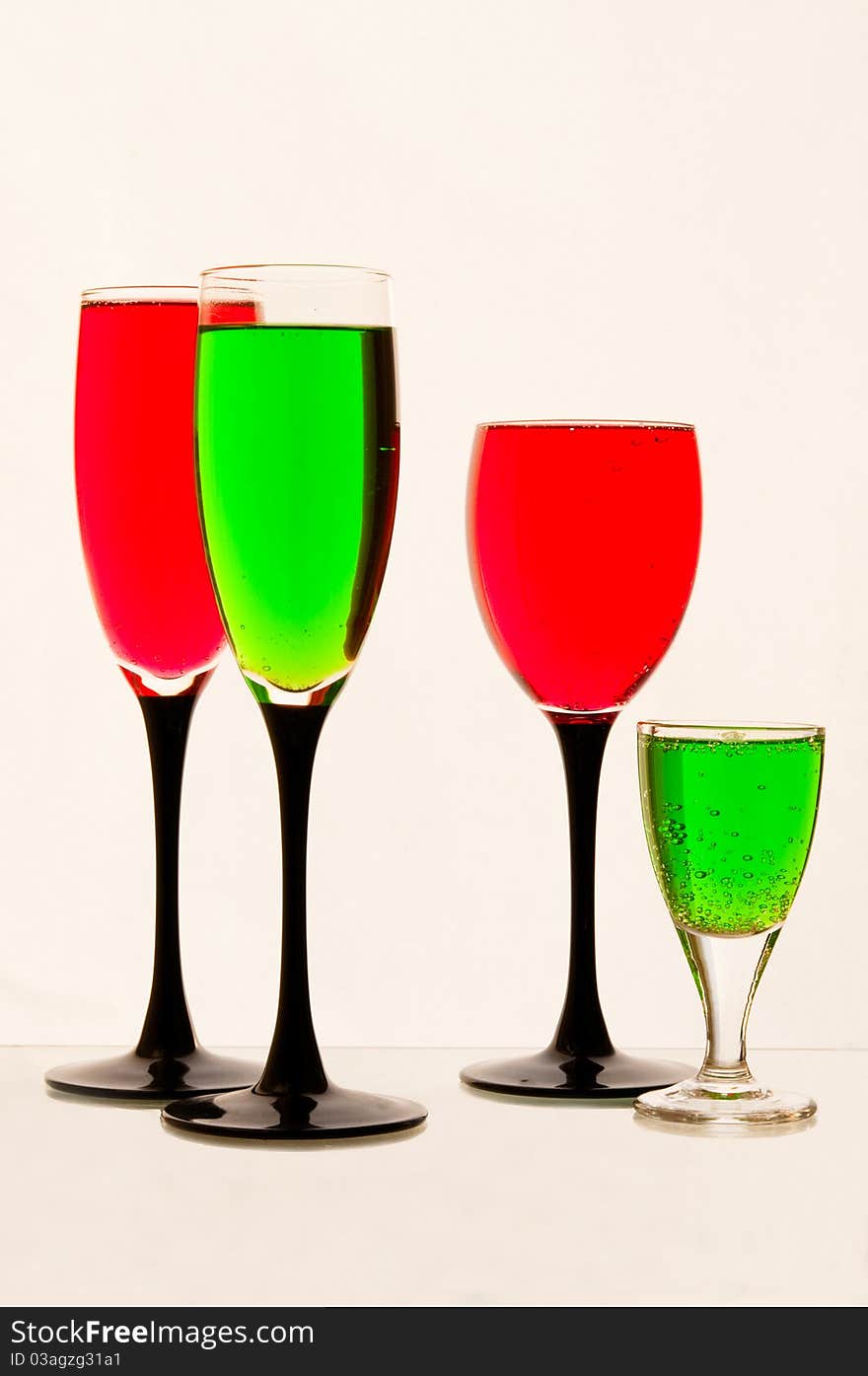 Lemonade in glasses  of  green, red color