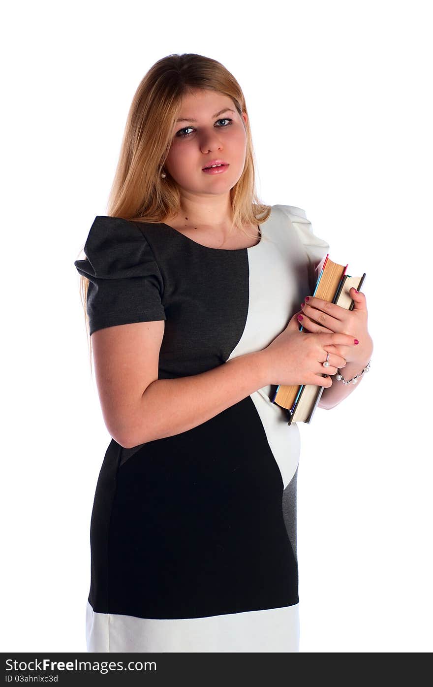 The young student with a heap of textbooks