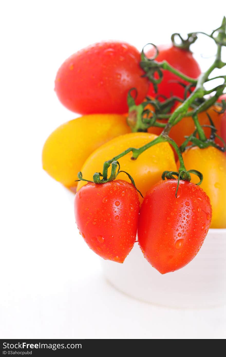 Fresh tomatoes isolated on white background