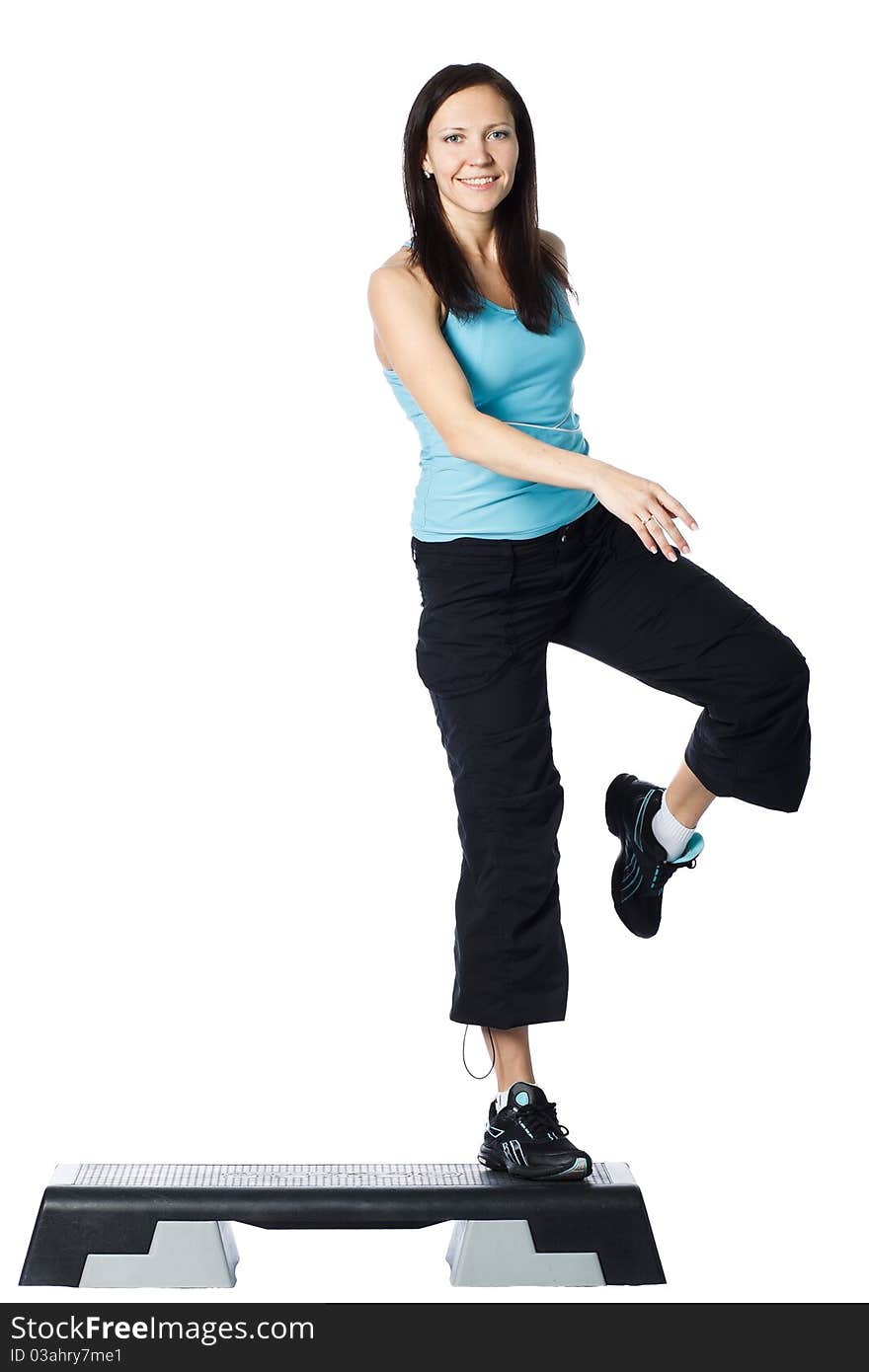 Girl is working out. Isolated on white