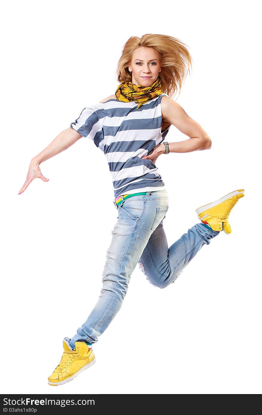 Girl is dancing and jumping. Isolated on white