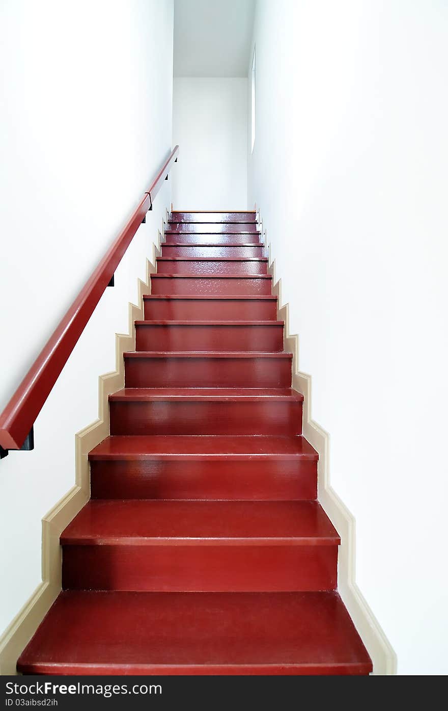 Staircase in white house