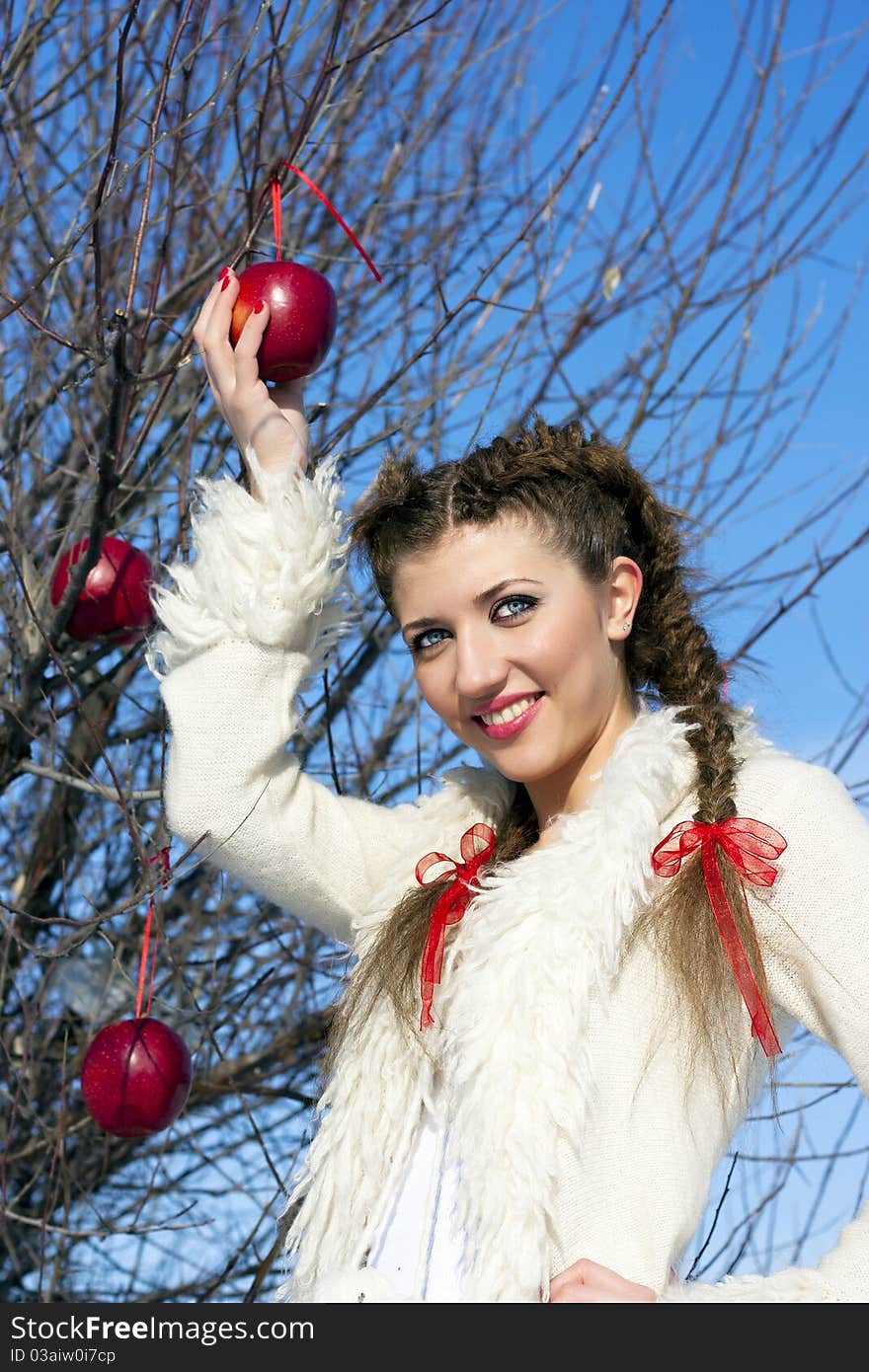 Portrait Of Beautiful Young Girl In Winter Day