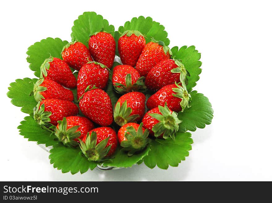 Strawberries and leave on  white background. Strawberries and leave on  white background