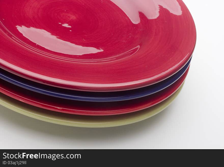 Colorful ceramic plates for the main dishes.