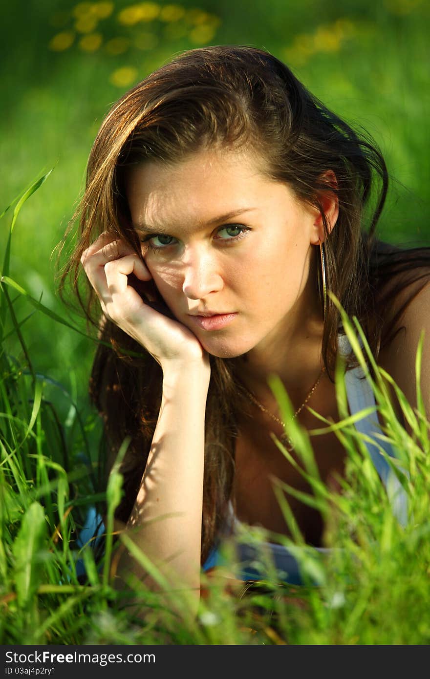 Brunette on grass