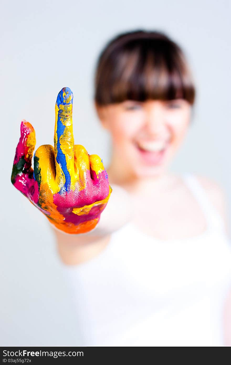 A girl with colored hands