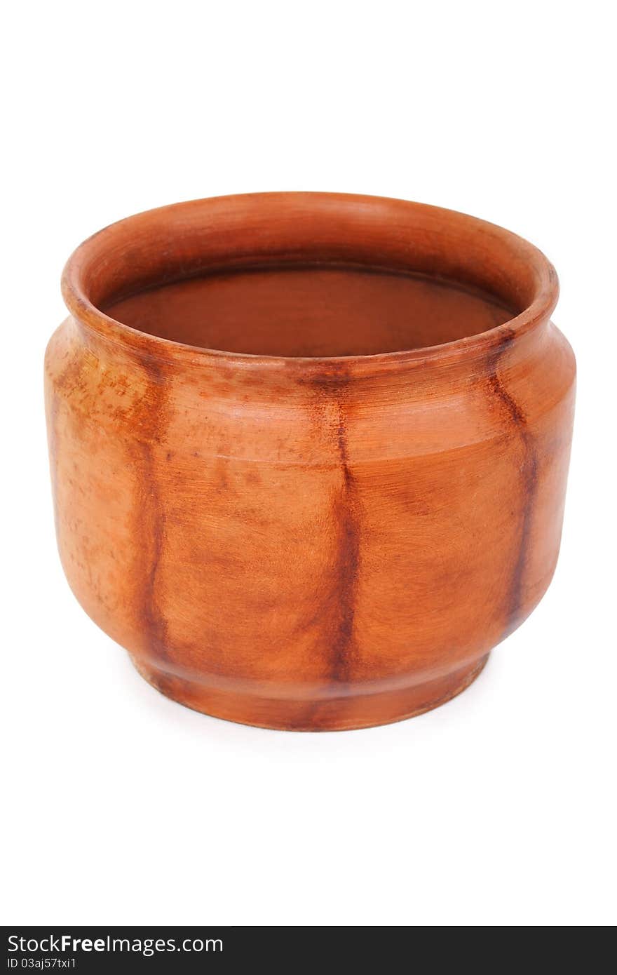 Big clay brown flowerpot with wood texture, view from above, isolated