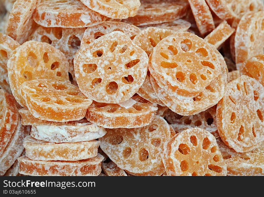 Slices Of Sweeten Preserved Lotus Root.They Can Be Eaten As Snack. Slices Of Sweeten Preserved Lotus Root.They Can Be Eaten As Snack