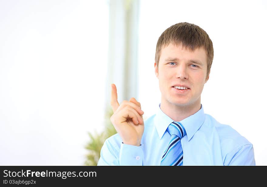 Portrait of successful businessman at office