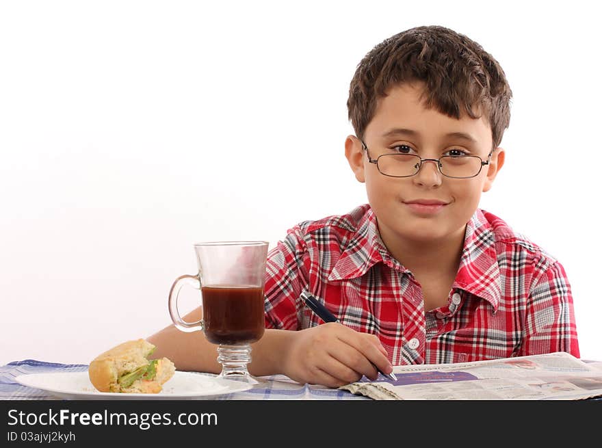 Kid in glasses reading newspaper. Kid in glasses reading newspaper