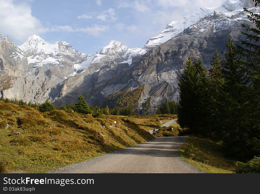 Walk in mountains, the Alpine landscape, autumn in Switzerland
On rest, vacation in the Alpes, mountain walk, tourism in mountains,