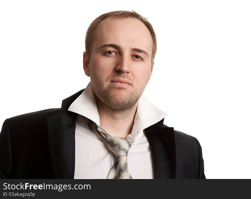 Disheveled businessman with unleashed a tie on a white background