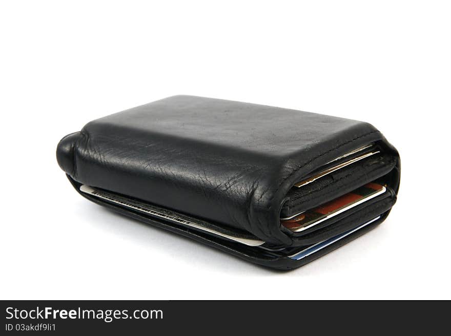 Black wallet full of cash and credit cards