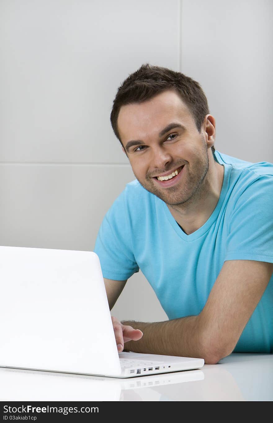 Young man with laptop