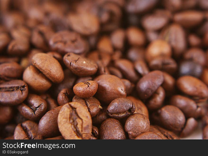 Brown coffee beans ready for grinding.