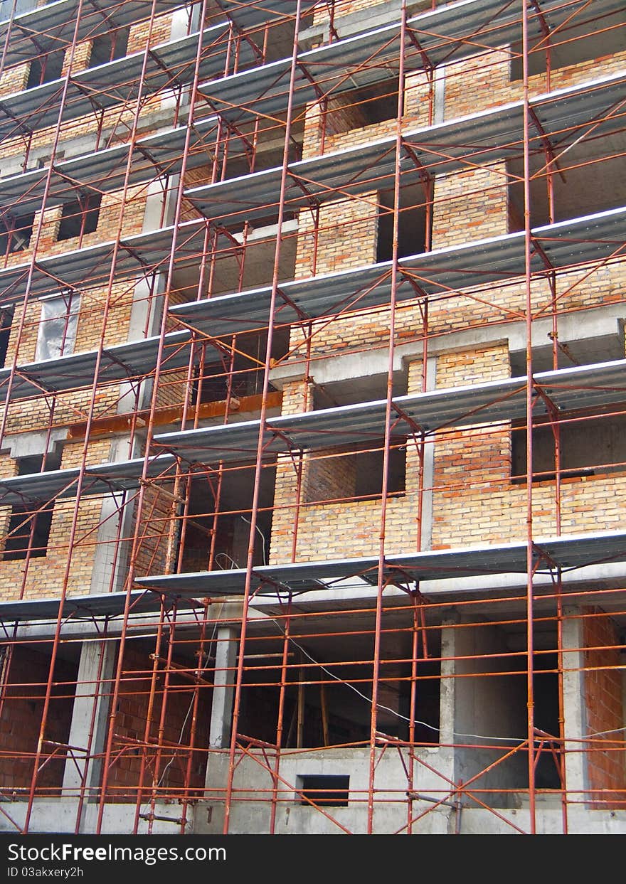 Construction site building and scaffolding