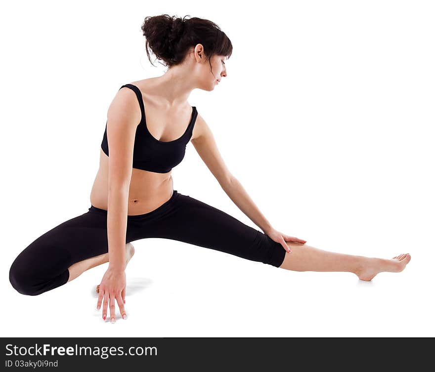 Beautiful young woman during workout with isolated background. Beautiful young woman during workout with isolated background.