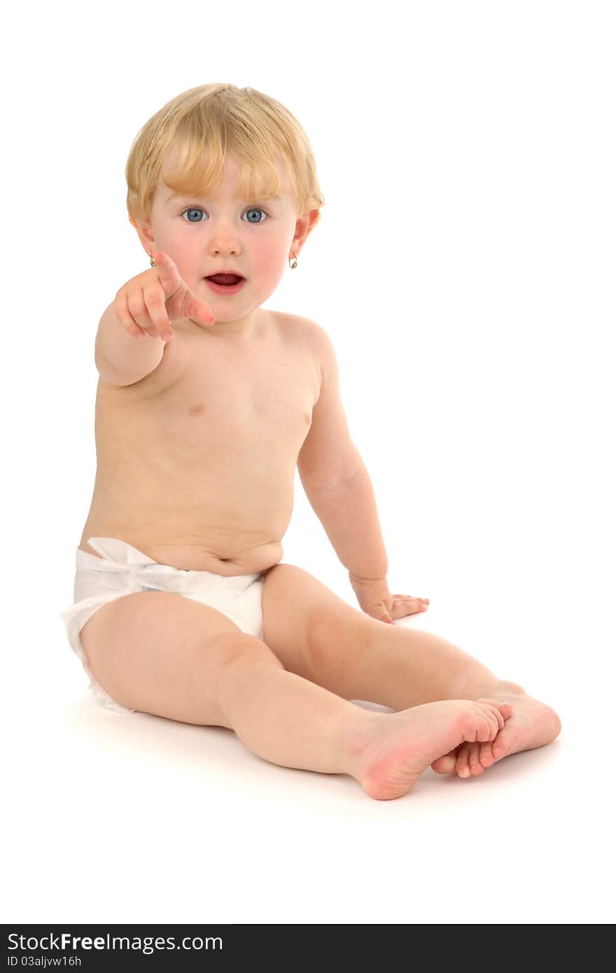 Child sits and shows finger, on white background. Child sits and shows finger, on white background.