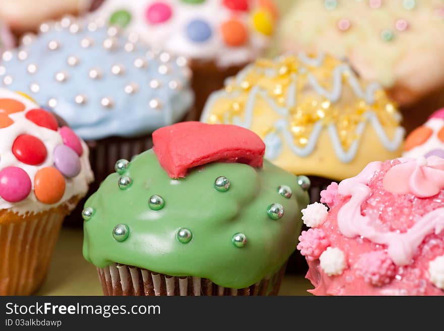 Macro picture of multi coloured cup cakes