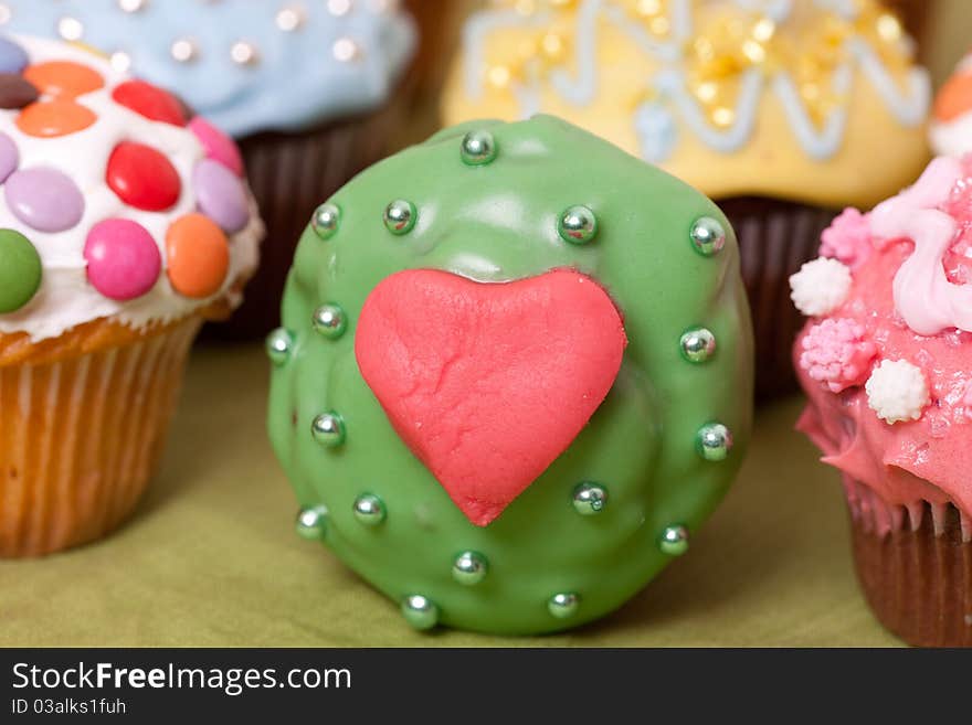 Macro picture of multi coloured cup cakes