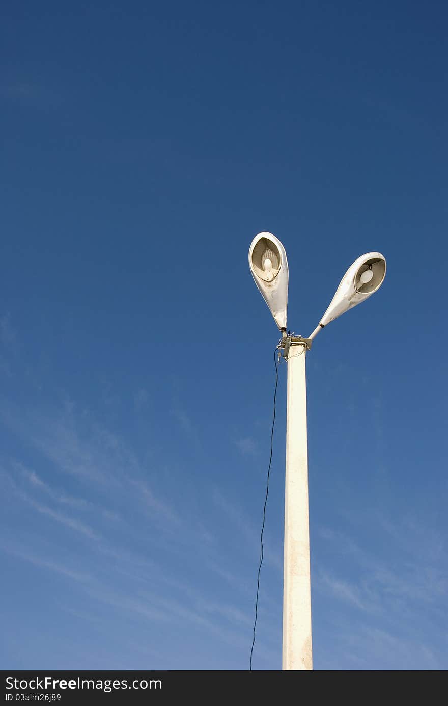 Two retro lamps on street stake