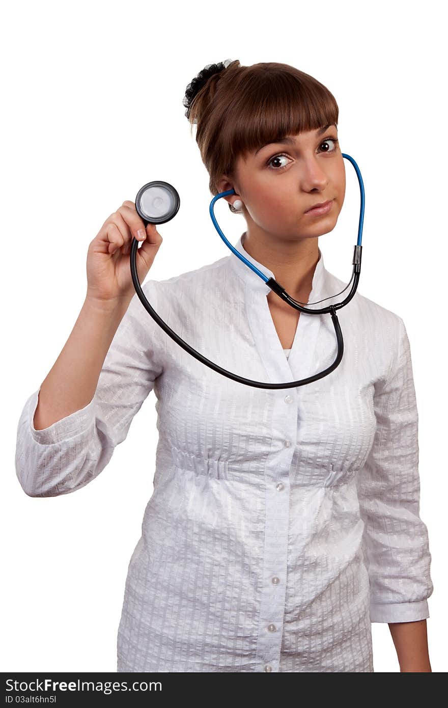 Beautiful young woman doctor with stethoscope isolated on white background