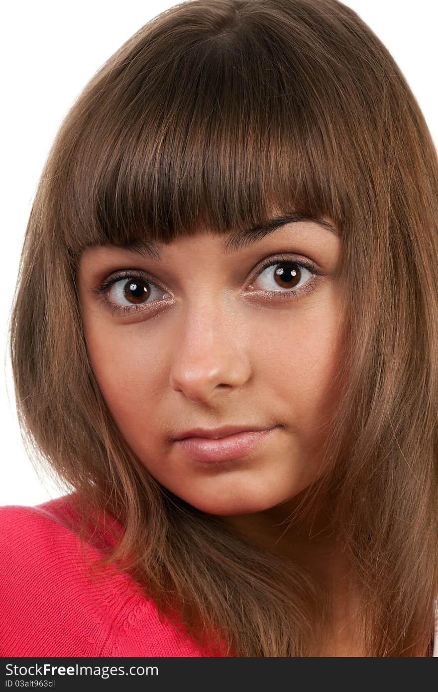 Portrait of the brunette in a red sweater isolated on a white background