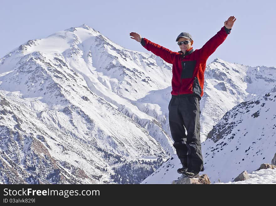 Joyful man in the mountains