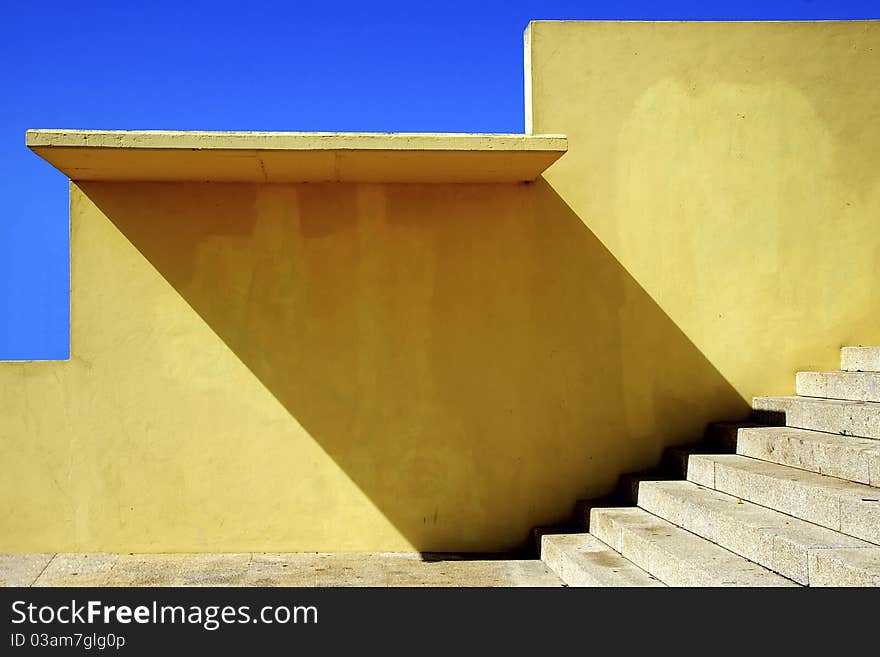 Yellow walls on blue sky background