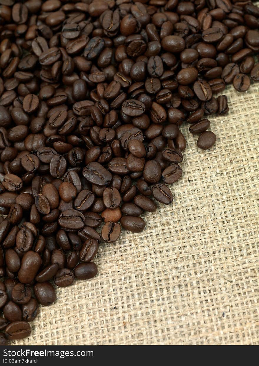 Coffee beans on a brown hessian bag