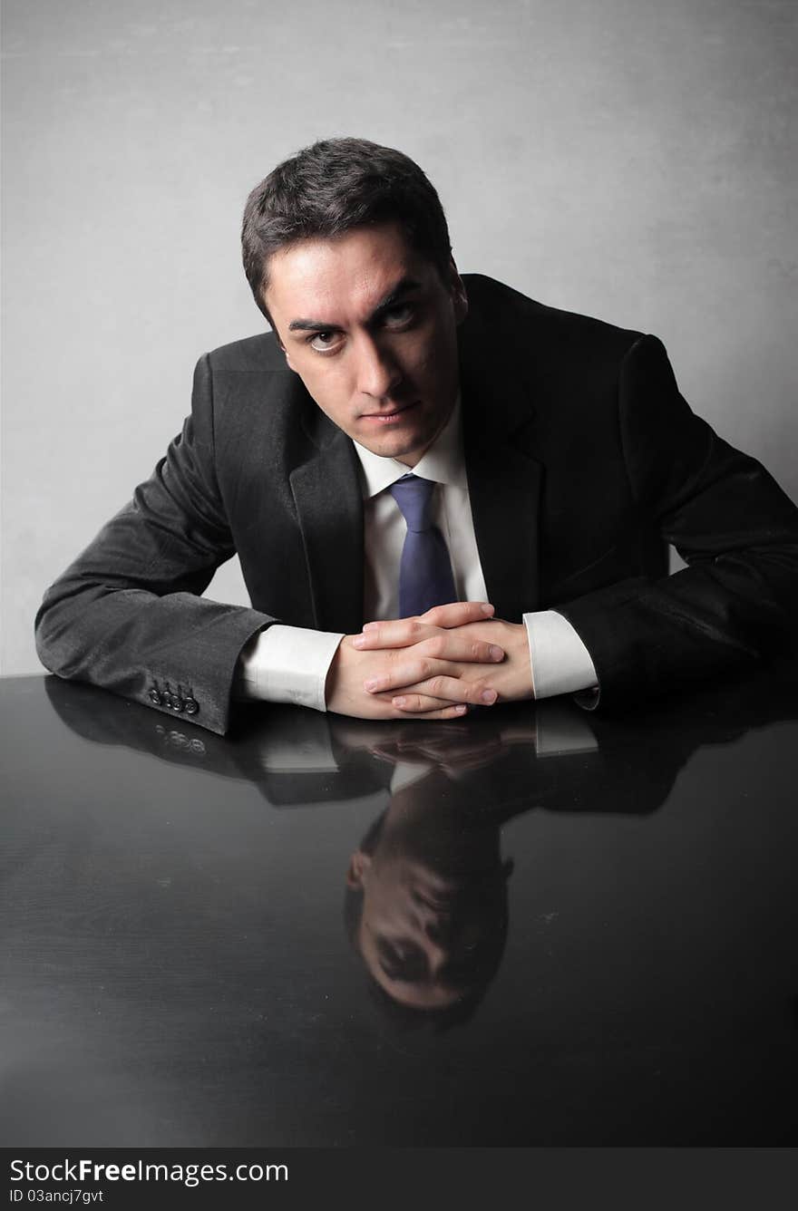 Portrait of a businessman with serious expression. Portrait of a businessman with serious expression