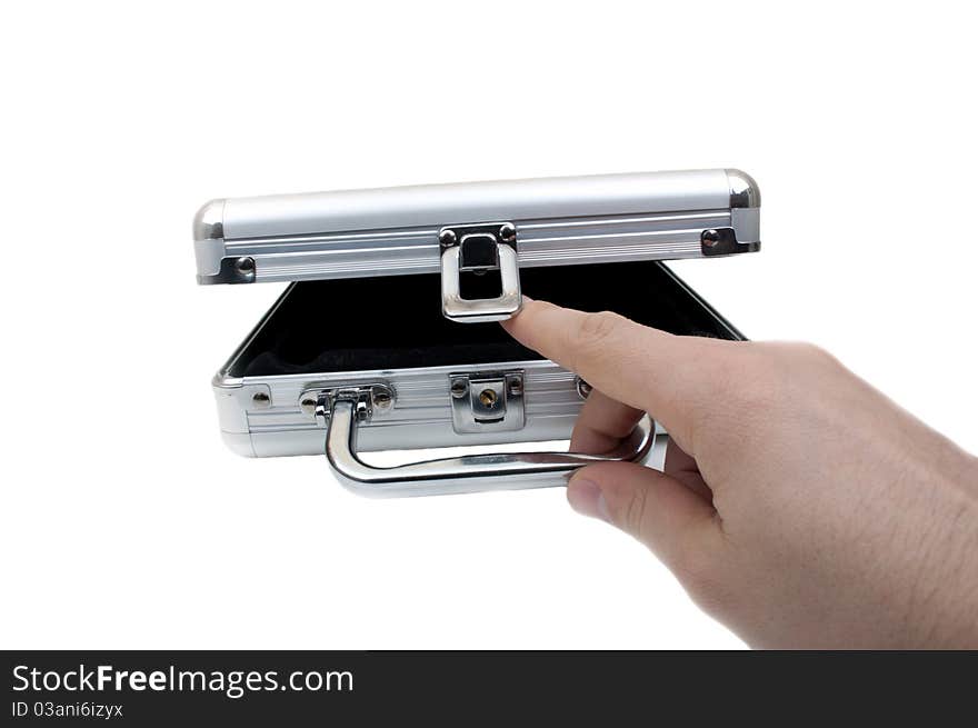 Open metal suitcase on a white background