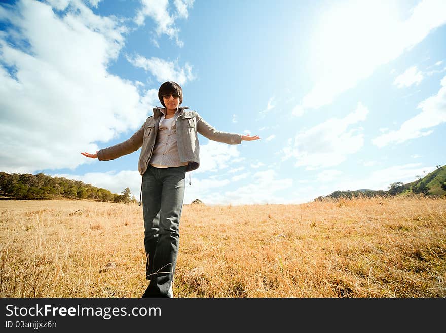 Young man rest on golden field. Young man rest on golden field.